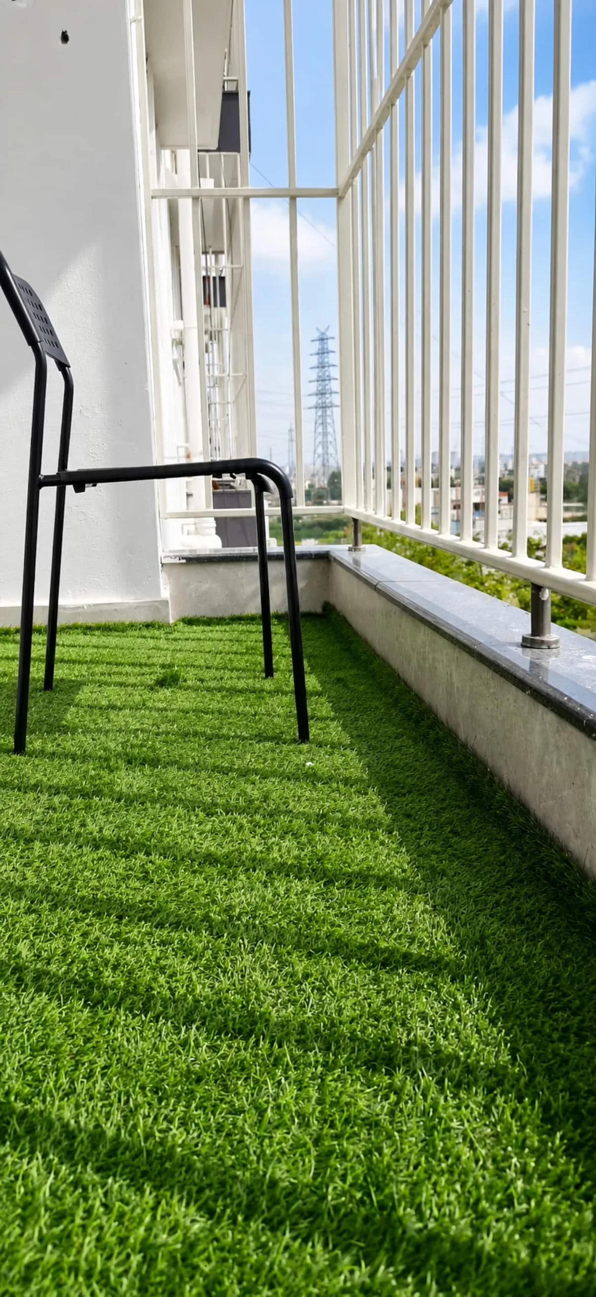 Modern balcony with city backdrop