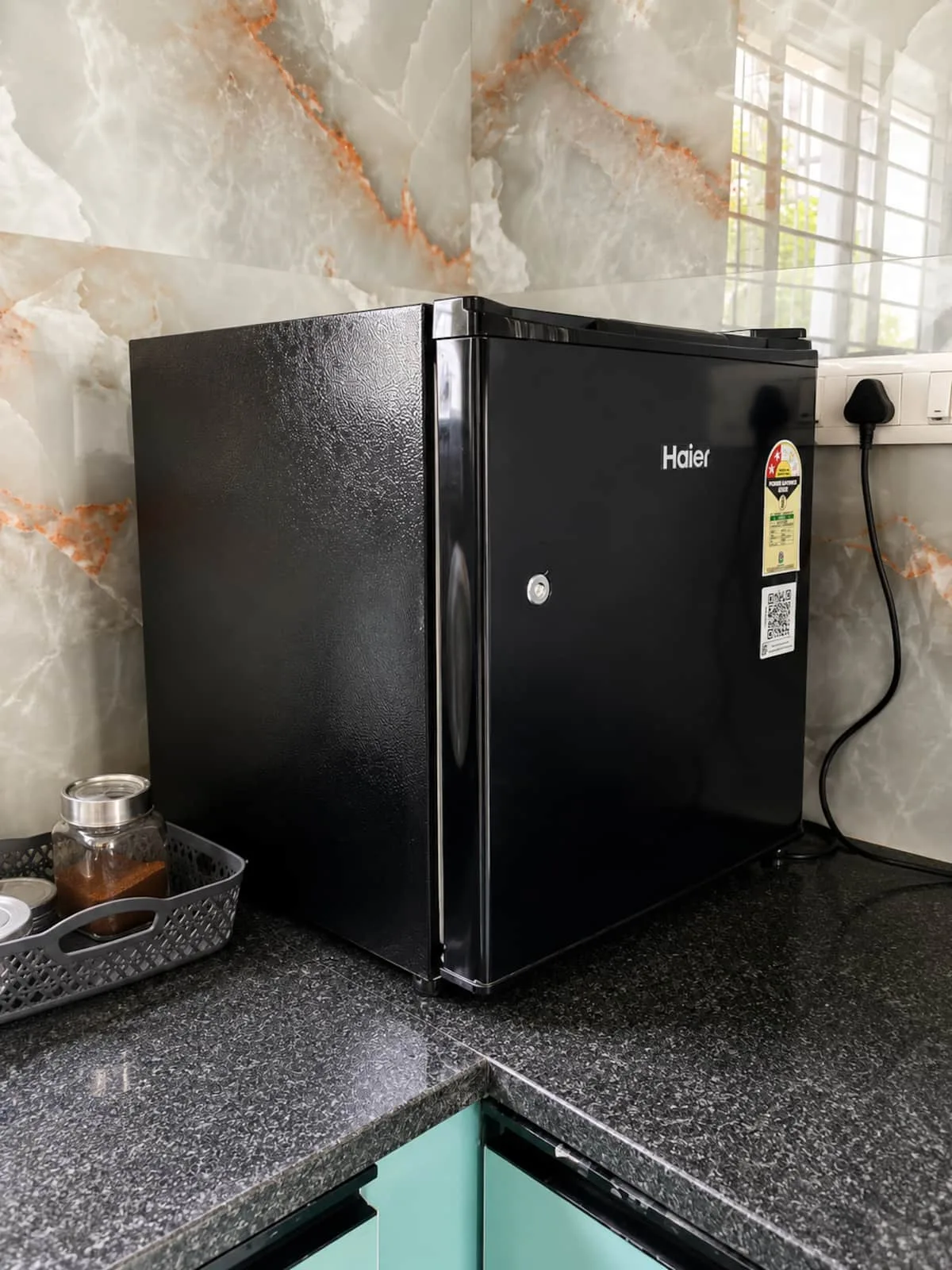 Modern kitchen corner with Haier fridge